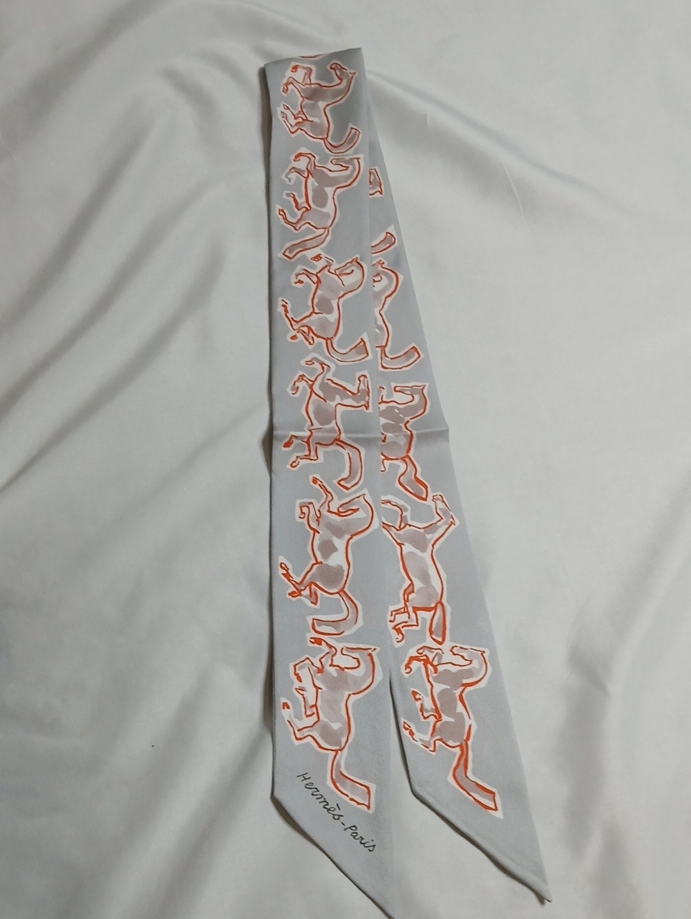 Hermes Chavaux En Liberte Grey and Orange Twilly Scarf with Horse Motif